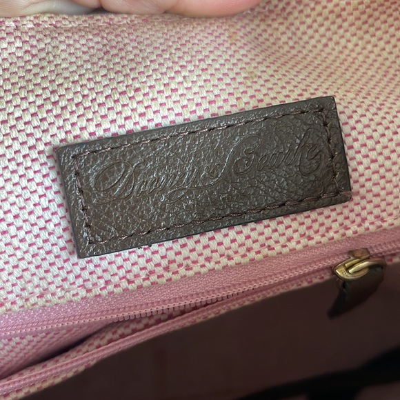 Dooney and Bourke. Brown leather shoulder bag. Has interior stains. - Picture 7 of 14